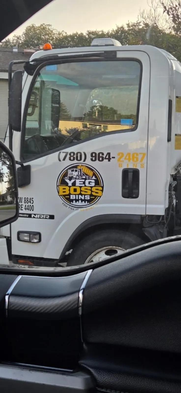YEG Boss Bins truck cab on a delivery run